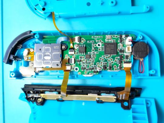 The PCB inside the blue controller